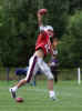 New England Patriots quarterback Tom Brady runs through drills during the first full of training camp at Bryant College in Smithfield, R.I., Friday, July 26, 2002. (AP Photo/Stew Milne) 