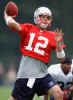 New England Patriots quarterback Tom Brady throws a pass during training camp Saturday, July 27, 2002, at Bryant College in Smithfield, R.I. (AP Photo/Michael Dwyer) 