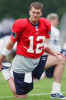 New England Patriots quarterback Tom Brady stretches during practice at training camp Saturday, July 27, 2002, at Bryant College in Smithfield, R.I. (AP Photo/Michael Dwyer) 