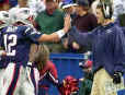 Injured Patriots QB Drew Bledsoe congratulates backup Tom Brady after he scored his first touchdown in a 44-13 rout of the Indianapolis Colts. (FOXSports