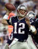 Superbowl XXXVI MVP quarterback Tom Brady of the New England Patriots drops back to pass against the Philadelphia Eagles as the Super Bowl champion Patriots face the Eagles in a pre-season NFL game August 17, 2002. The game is the first NFL game to be played at the newly opened Gillette Stadium in Foxboro, Massachusetts. REUTERS/Jim Bourg 