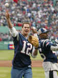 New England Patriots Super Bowl Champions quarterback Tom Brady (12) and cornerback Otis Smith (45) toss out multiple ceremonial first pitches prior to the star of the Boston Red Sox's home opener against the Toronto Blue Jays at Fenway Park, Monday, April 1, 2002. (AP Photo/Winslow Townson) 