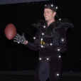 New England Patriots' quarterback Tom Brady, the MVP of this year's Super Bowl, wears a black suit with reflective balls during a break in the animation image capturing session for a new video football game featuring his likeness Tuesday May 7, 2002 in San Diego. (AP Photo/Lenny Ignelzi)