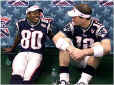 Brady (right) and wide receiver Troy Brown wait to get their pictures taken. (Globe Staff Photo / Bill Greene) 