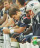 New England Patriots quarterback Tom Brady hangs his head on the bench in the last minutes of their 28-10 loss to the Green Bay Packers at Gillette Stadium in Foxboro, Mass. Sunday, Oct. 13, 2002. (AP Photo/Chitose Suzuki) 