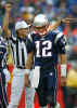 New England Patriots quarterback Tom Brady walks off the field as referee Bernie Kukar, rear left, signals after Brady was intercepted against the Green Bay Packers in Foxboro, Mass., Sunday Oct. 13, 2002. The Packers beat the Patriots 28-10. (AP Photo/Winslow Townson) 