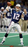 Tom passes the ball during a play in Super Bowl XXXVI.