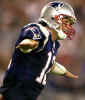 New England Patriots quarterback Tom Brady spreads his arms as if to fly as he runs back to the bench following a touchdown by wide receiver Deion Branch in the third quarter against the Pittsburgh Steelers in Foxboro, Mass., Monday night Sept. 9, 2002. (AP Photo/Steven Senne) 