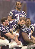 Tom Brady (12), Joe Andruzzi (63), Damien Woody (65) and Antowain Smith (32) will all start for the Pats. (FOXSports)