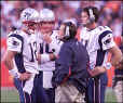 Tom Brady, Damon Huard, and Drew Bledsoe discuss the game with head coach Bill Belichick (b0st0n419)