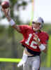 New England Patriots quarterback Tom Brady makes a pass during training camp in Smithfield, R.I. on Thursday, Aug. 1, 2002. (AP Photo/Steven Senne)  