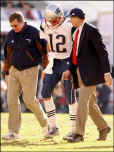 Tom walks off the field during the AFC Championship game against the Steelers.  Tom received a crushing hit from the Steelers' Lee Flowers, which resulted in his leaving the game in the hands of former Patriots starter Drew Bledsoe.